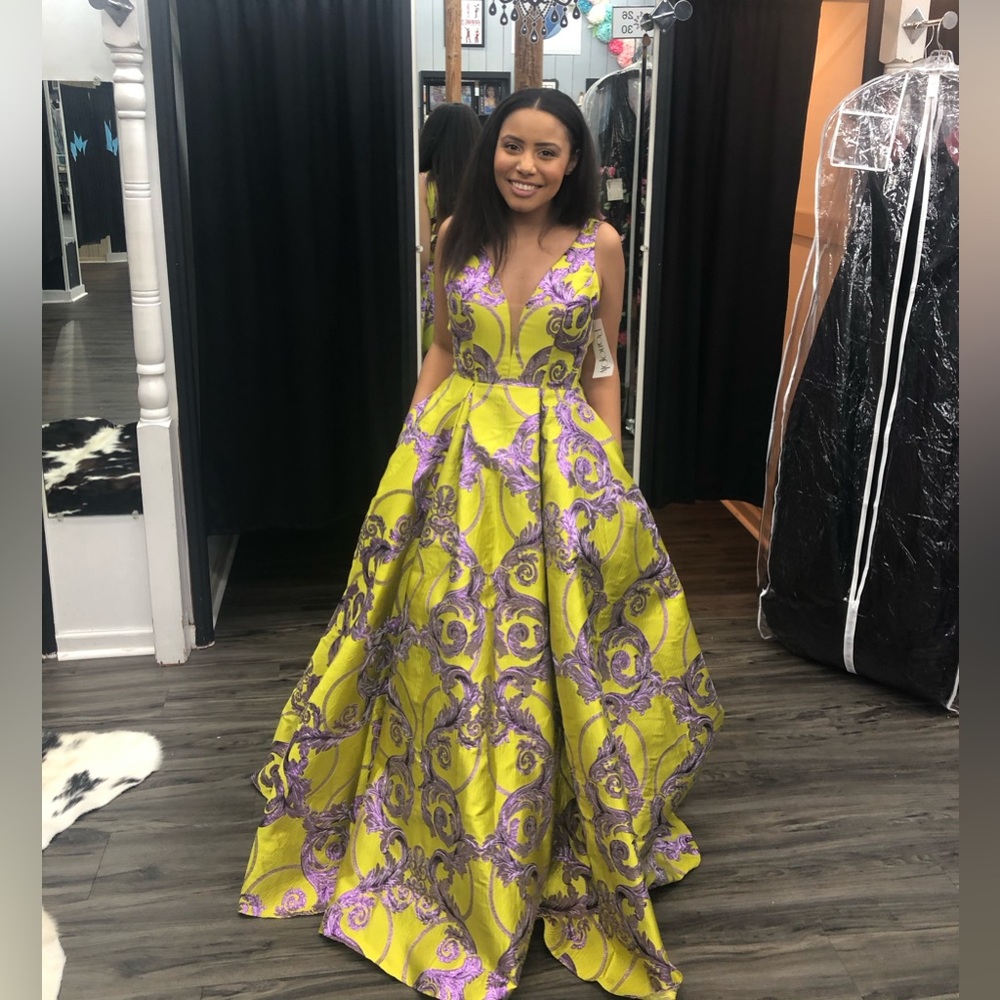 Green and purple gown